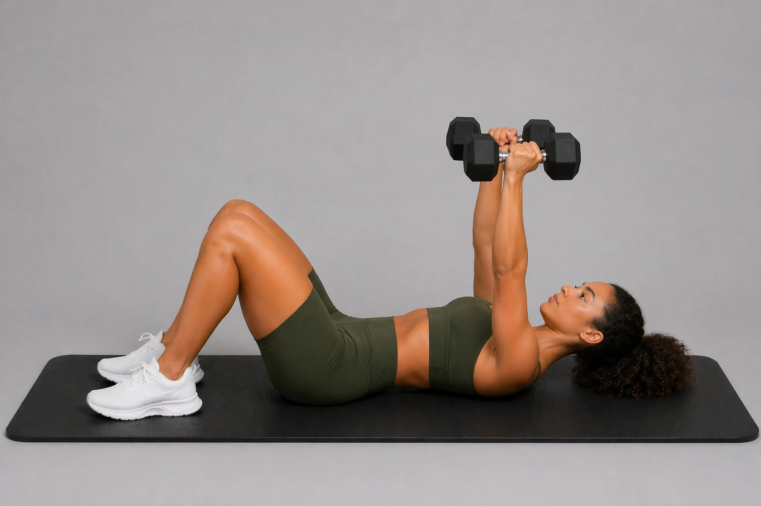 Floor dumbbell press top position